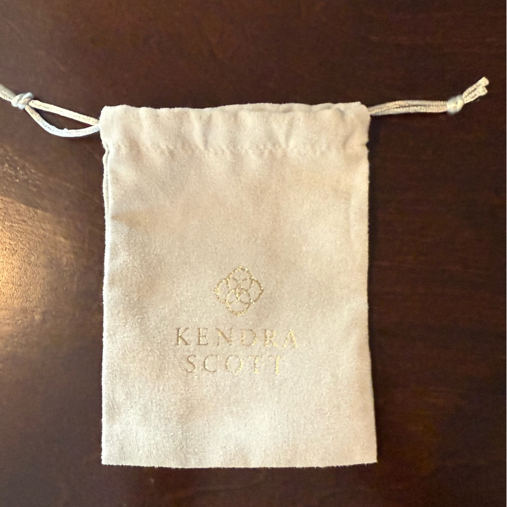 Kendra Scott travel jewelry pouch - gray with gold logo